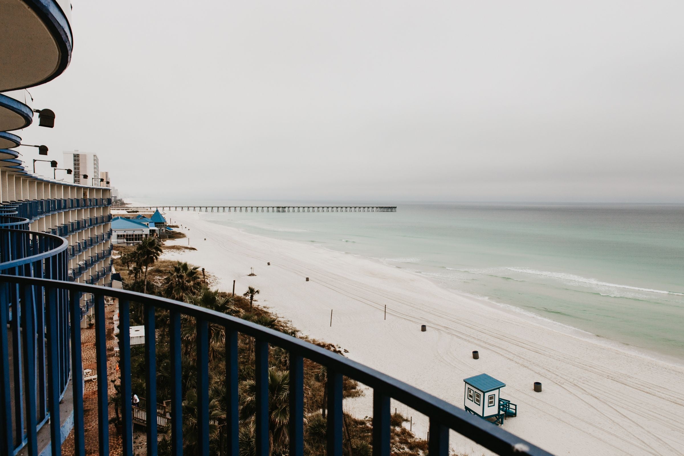 The beach and pier at Panama City Beach seen from a balcony